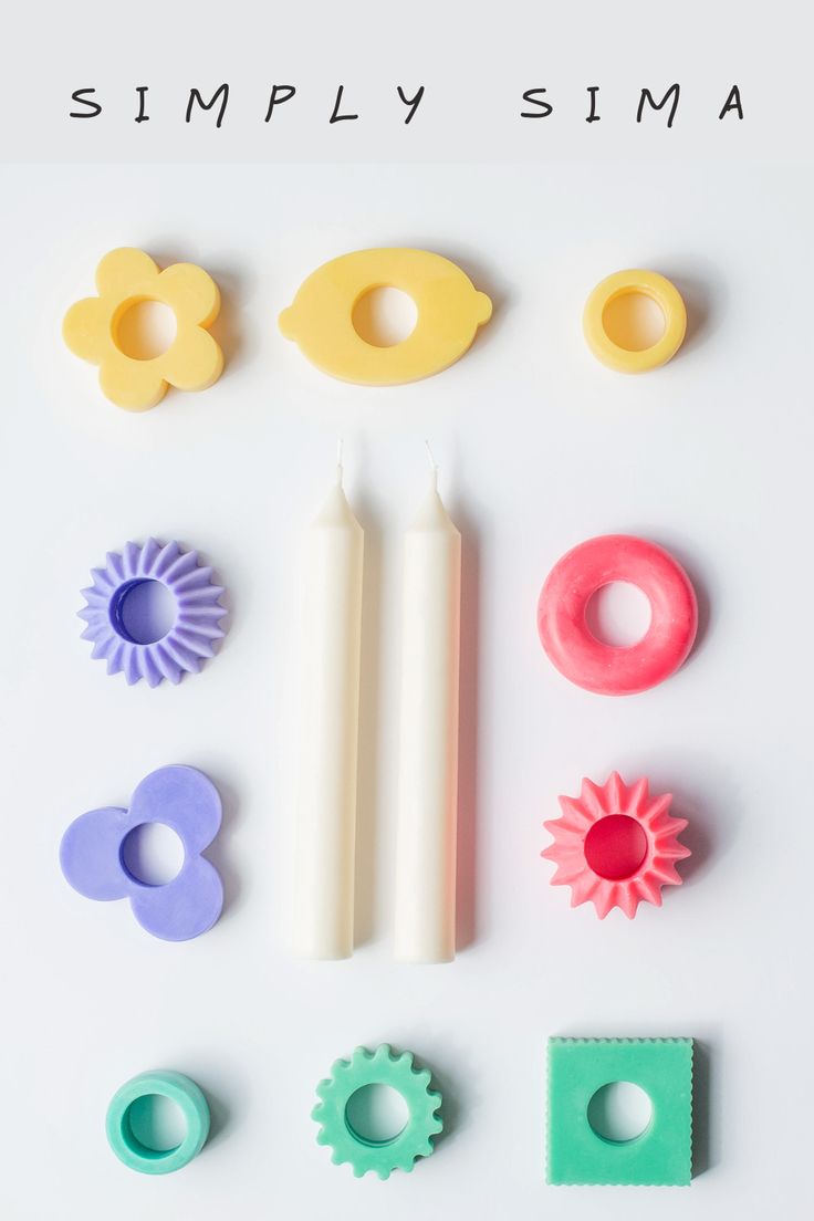 various plastic objects are arranged on a white surface with the words simply simple written above them