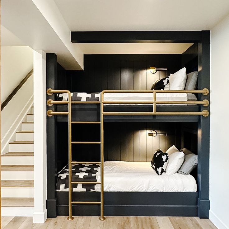 a bunk bed in a room with stairs