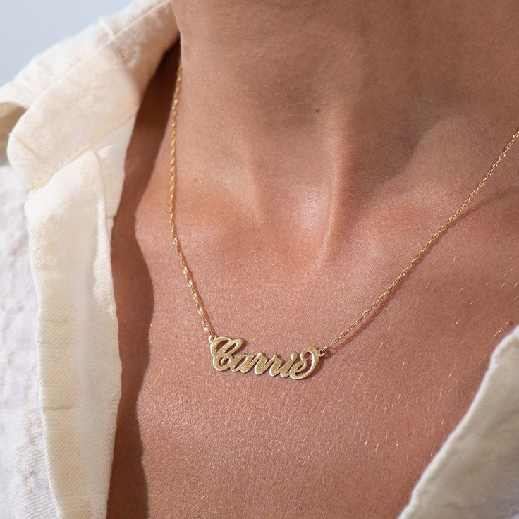 "Personalized Carrie Nameplate Necklace for Her: Personalized engraved own name necklace gift ideas in 14k yellow and white solid gold. The perfect gift for mom, grandma, wife, sister, best friend or yourself. ✨ SIZE & MATERIALS ✨ Material: 14K Yellow Solid Gold, 14K White Gold Thickness: 0.4mm / 0.02\" Measurements: 5.08mm - 10.16mm / 0.2\" - 0.4\" (depends on length of name) Chain style: ★★ 14K Yellow Gold: Twist Chain ★★ 14K White Gold: Box Chain ★ Chain styles cannot be mixed, they depend on White Gold Nameplate Necklace With Names, Yellow Gold Name Necklace For Anniversary Gift, Engraved White Gold Nameplate Necklace, Anniversary Nameplate Name Necklace With Hallmarks, Yellow Gold Name Necklace For Anniversary, Yellow Gold Nameplate Jewelry With Names, Personalized 14k Name Necklace For Mother's Day, Gold 14k Name Necklace For Anniversary, Personalized 14k Stamped Name Necklace For Mother's Day