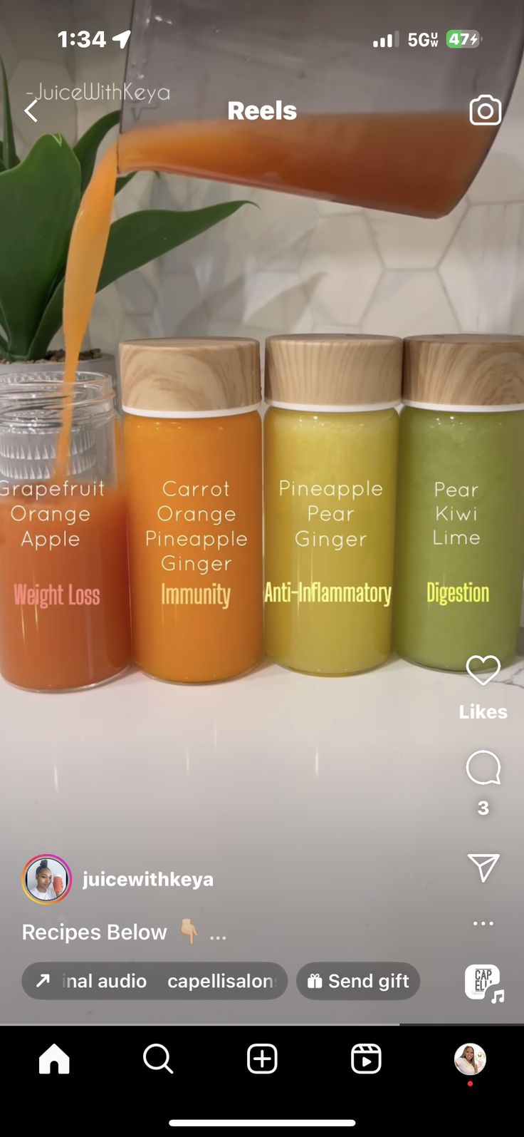 an image of some jars with different types of food in them on a table and one is pouring orange juice into the jar