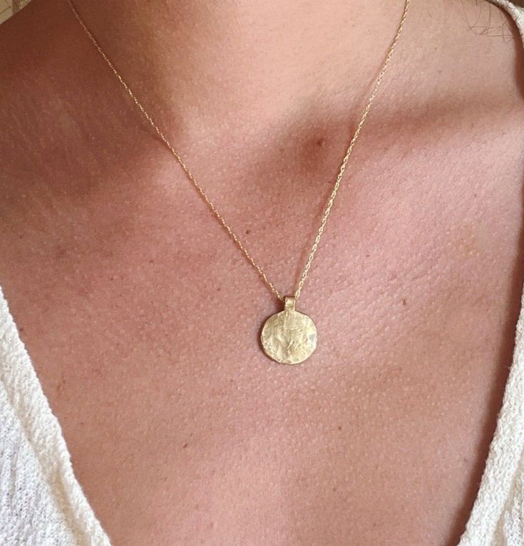 One of our signature pendants in the shape of la luna, a wearable reminder to embrace life's natural rhythms, 18" chain pictured, brass variation comes with 14 K gold filled chain Gold Brass Round Disc Jewelry, Everyday Hammered Medallion Jewelry, Gold Sterling Silver Medallion Necklace For Everyday, 14k Gold Hammered Round Pendant Jewelry, Minimalist Recycled Gold Medallion Jewelry, Everyday Gold Plated Round Disc Necklace, Everyday Round Disc Gold Plated Necklace, Everyday 14k Gold Filled Coin Pendant Jewelry, Brass Jewelry With Delicate Chain And Round Pendant