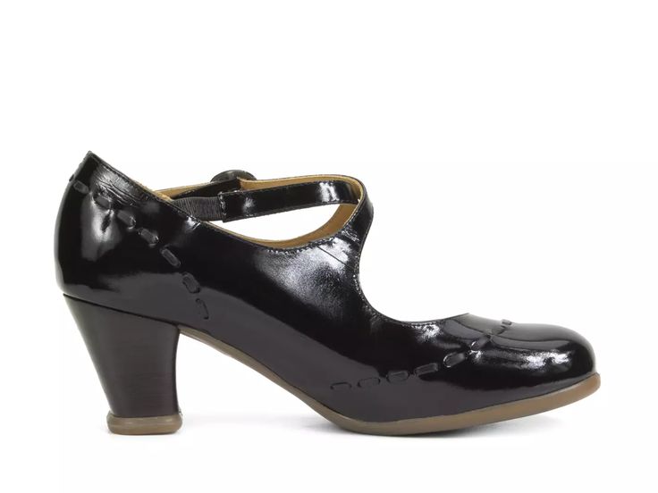 This legendary 2.5" heeled maryjane was inspired by Maria Malibran, one of the most famous opera singers of the 19th century, who was known for her extraordinary flexibility, range, and power. With glossy leathers, soft rubber soles, and a leather wrapped heel, this shoe could possibly be the most functional and comfortable Fluevog ever. The Malibran will be your everyday, dress-up, dress-down, favourite pair of shoes perfect for anything and everything (which is almost impossible). Your Love Ma Black Mary Janes With Sculpted Heel For Formal Occasions, Mary Jane Court Shoes With Reinforced Low Heel, Mary Janes With Sculpted Low Heel, Black Mary Janes With Penny Strap For Formal Occasions, Formal Low Heel Mary Janes With Heel Strap, Formal Closed Toe Mary Janes With Heel Strap, Formal Retro Mary Janes With Ankle Strap, Formal Closed-toe Mary Janes With Heel Strap, Formal Black Mary Janes With Penny Strap