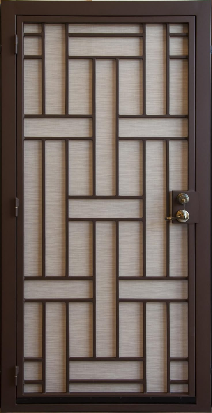 the door is made out of wood and has an intricate design on it's side