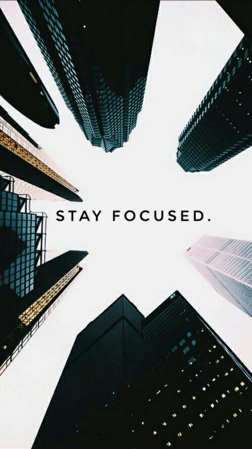 the words stay focused are surrounded by tall buildings