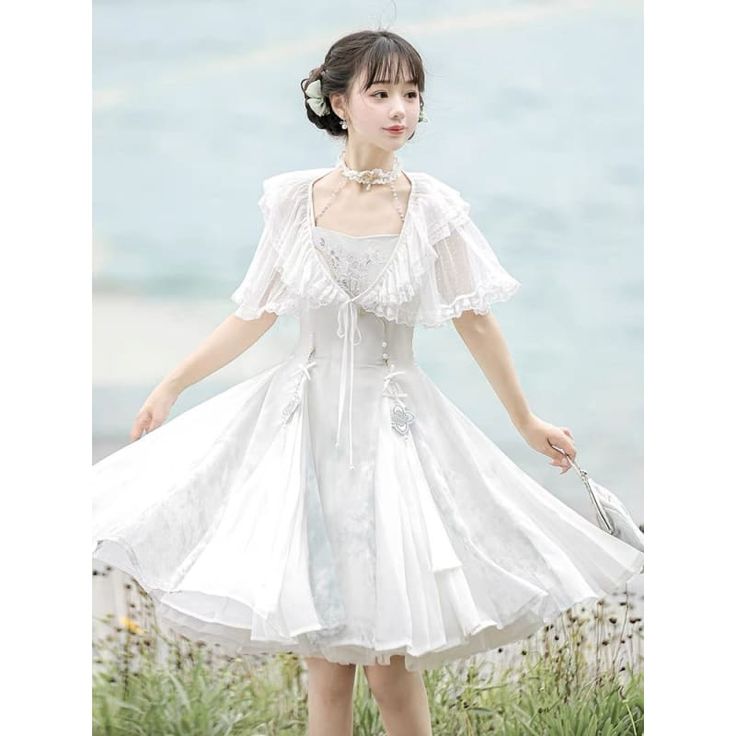 Fairy White Princess Dress Transform into a fairy princess with this elegant Fairy White Princess Dress. Made with delicate, high-quality fabric, this dress will make you feel ethereal and magical. Perfect for special occasions or dress-up play, this dress is a must-have for any little princess. Embrace your inner royalty and shine in this beautiful dress. Size Chart (cm) ? Bust Waist Dress Length S 87 69 92 M 91 73 94 L 95 77 96 Fairycore A-line Party Dress, A-line Fairycore Dress For Party, White Fairycore Corset Dress With Ruffles, Summer Princess Fairy Dress For Garden Party, Fairycore Chiffon Party Dress, Fairycore Chiffon Dress For Garden Party, Fitted Princess Style Spring Fairy Dress, Summer Princess Style Fairy Dress, Spring Fairytale Fairy Dress For Dress-up