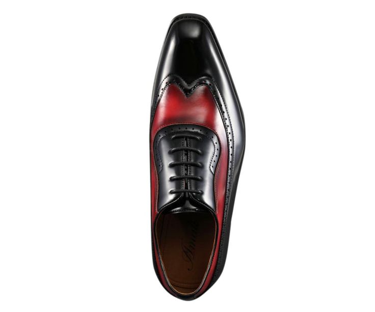 Revamp your formal attire with the Amali Everett black and red oxford shoes. Made for the refined and discerning gentleman, these men's wingtip dress shoes seamlessly blend classic sophistication with contemporary artistry. Appropriate for weddings, professional gatherings, and high-end occasions, the Everett shoes will elevate your fashion and showcase your refined taste. Elevate your style with the premium PU leather Everett oxfords. Boasting an intricate black and red two-tone hue, these shoe Red Cap Toe Oxfords For Semi-formal Occasions, Business Oxfords With Red Sole And Plain Toe, Business Oxfords With Plain Toe And Red Sole, Elegant Wingtip Lace-up Shoes With Red Sole, Fitted Wingtip Dress Shoes For Business, Formal Cap Toe Oxfords With Red Sole, Formal Dress Shoes With Red Sole And Cap Toe, Formal Cap Toe Dress Shoes With Red Sole, Office Dress Shoes With Red Sole