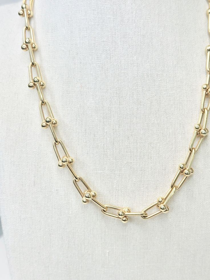 This 5mm chain link necklace crafted from luxurious 14kt yellow gold or white gold will add a modern and sophisticated touch to your ensemble. The classic yet contemporary design is a timeless piece of elegance that will be sure to impress. Luxury Oval Link Box Chain Necklace, Classic Chunky Chain Necklace With Rectangular Links, Luxury Gold Chain Link Necklace, Timeless Chunky Chain Link Necklace, Modern Gold Chain Necklace For Everyday Luxury, Modern 14k Gold Chain Necklace With Rectangular Links, Modern 14k Gold Chain Necklace, Classic Link Chain Necklace With Chunky Chain, Classic Gold-tone Necklaces With Solid Link Construction