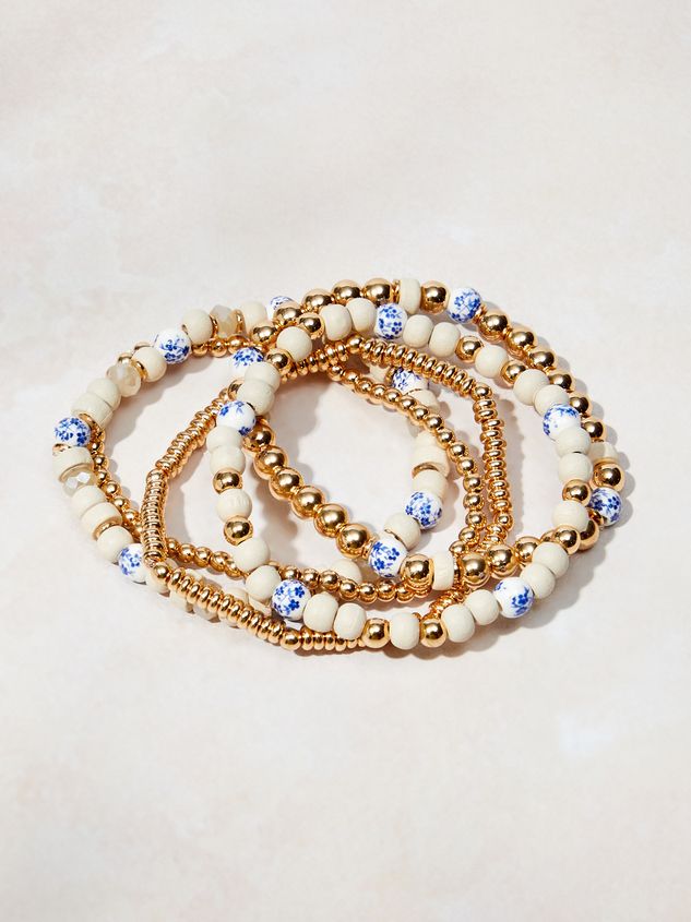 This 5-piece bracelet set lets you play with your style! Stack the two gold bangles for a simple look, or add the colorful bracelets with blue pearls and natural beads for a touch of boho flair. Mix and match for endless combinations! Bohemian Gold Pearl Bracelet With Round Beads, Bohemian Gold Pearl Bracelet With Colorful Beads, Smart Watch Bands, Beaded Bow, Blue Pearls, Boho Bangle, Preppy Jewelry, Bracelet Pack, Gold Bracelet Set