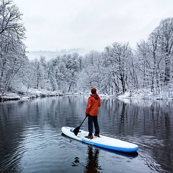 Man is standing on the paddleboard in winter Winter Paddle Boarding, Sup Camping, Winter Surfing, Paddle Boarding Outfit, Kneeboarding, Paddle Board Yoga, Sup Paddle Board, Stand Up Paddling, Sup Board