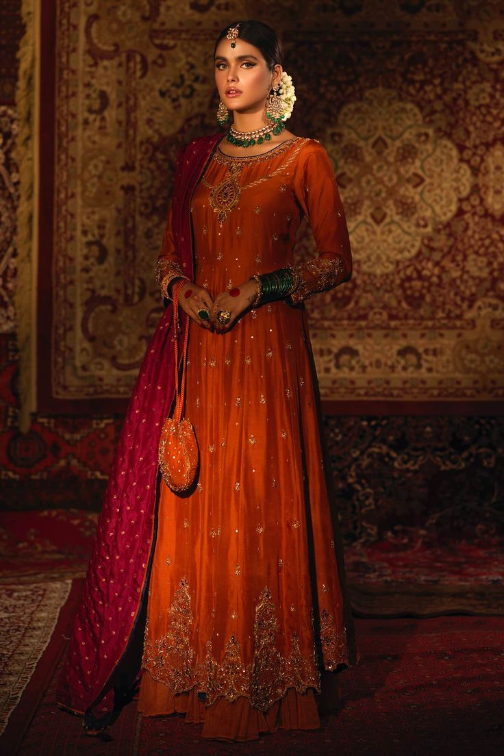 Itr (100% Advance Payment)– Zaaviay Designer Orange Sharara With Zari Work, Designer Kundan Anarkali Set With Traditional Drape, Designer Orange Chinon Sharara, Kundan Anarkali Set With Dabka Work For Transitional Season, Orange Anarkali Set With Traditional Drape For Designer Wear, Elegant Red Anarkali Set With Cutdana, Festive Naqshi Traditional Dola Silk Wear, Traditional Orange Anarkali Set For Designer Wear, Orange Anarkali Set With Zari Work Traditional Drape