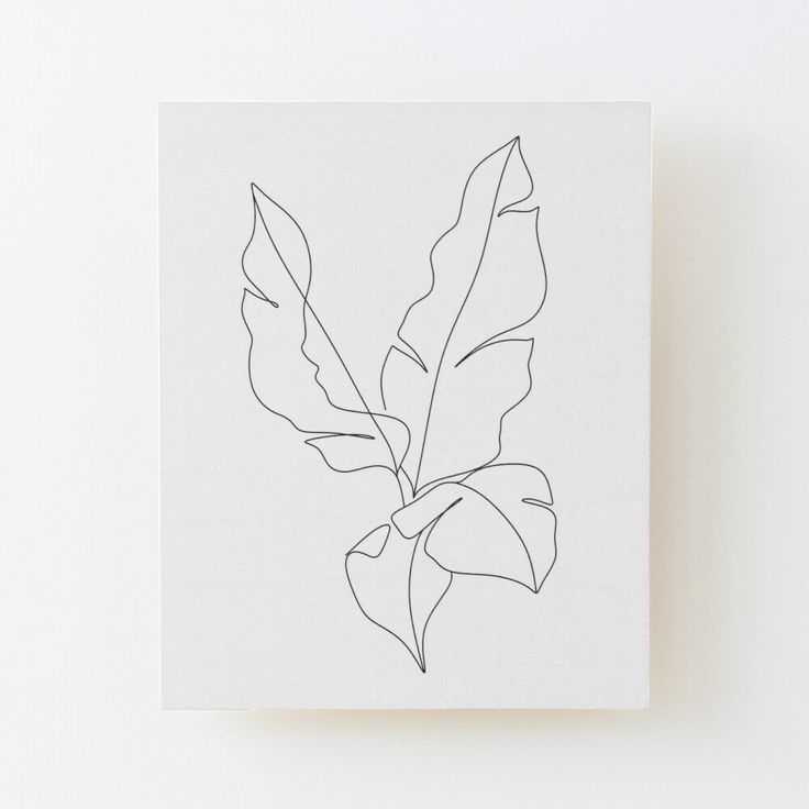 a black and white drawing of a leaf