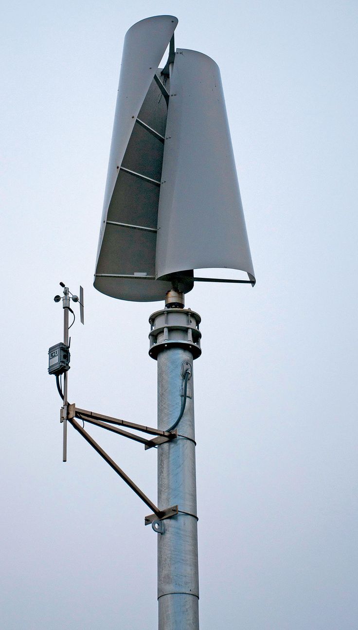 a metal pole with a large antenna attached to it