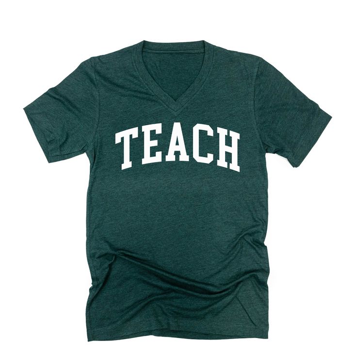 adult_unisex_tee_teach_varsity_font_little_mama_shirt_shop College Stretch T-shirt With Letter Print, Stretch Short Sleeve College T-shirt, Casual Fitted T-shirt With Team Name, Stretch Cotton T-shirt For College, Cotton Stretch T-shirt For College, Fitted Pre-shrunk College T-shirt, Fitted Pre-shrunk T-shirt For College, Fitted Tan T-shirt With Letter Print, Fitted Green Tops For College