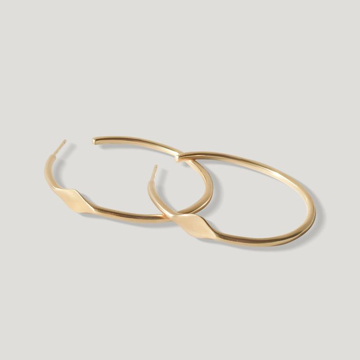 Large Signet Hoop Earrings - Gold Modern Hammered Hoop Earrings For Formal Events, Modern Hammered Hoop Earrings For Formal Occasions, Modern Twist Yellow Gold Hoop Earrings For Everyday, Minimalist Diamond Cut Hoop Earrings For Everyday, Modern Everyday Earrings In Recycled Gold, Modern Everyday Earrings Made From Recycled Gold, Classic Hammered Hoop Earrings For Everyday, Minimalist Small Hoop Diamond Cut Earrings, Modern Twist Jewelry With Simple Design For Everyday