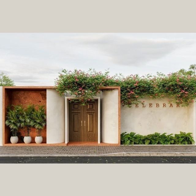 an entrance to a building with plants growing on it