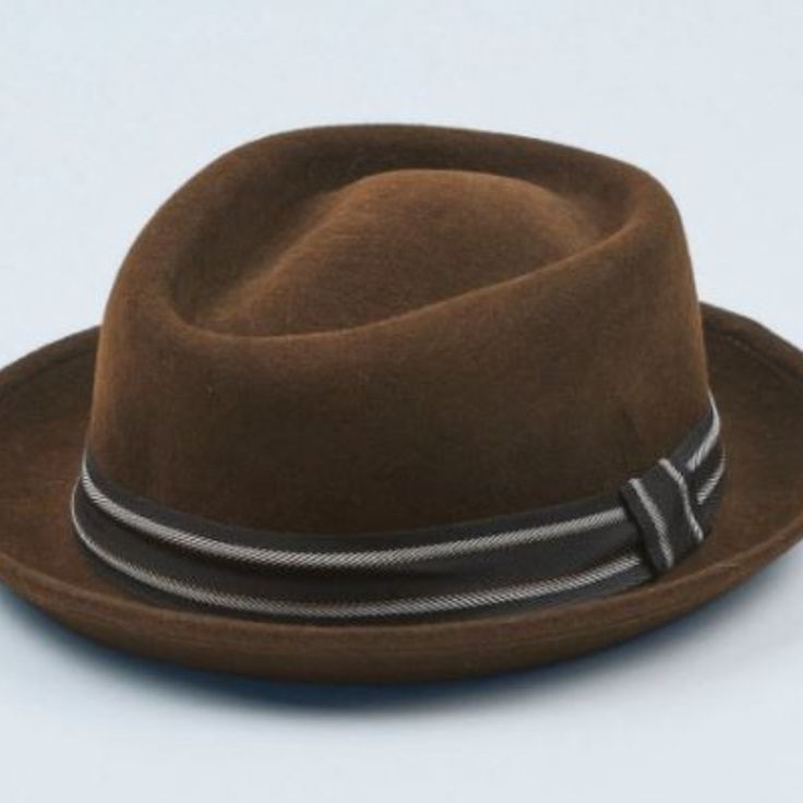 Unisex-Handcrafted By Expert Artisans Made Of 100% Wool - Water Repellent Lined Internally With 100% Cotton Weight - 0.5lbs. Dimension - 12" X 11" X 4". Brim Size - 2” Fitted Brown Hat For Kentucky Derby, Vintage Fitted Brown Panama Hat, Fitted Vintage Brown Panama Hat, Fitted Brown Felt Hat With Flat Brim, Brown Fitted Fedora For Kentucky Derby, Fitted Brown Brimmed Top Hat, Fitted Winter Six-panel Hats, Fitted Brown Top Hat With Short Brim, Fitted Six-panel Winter Hat