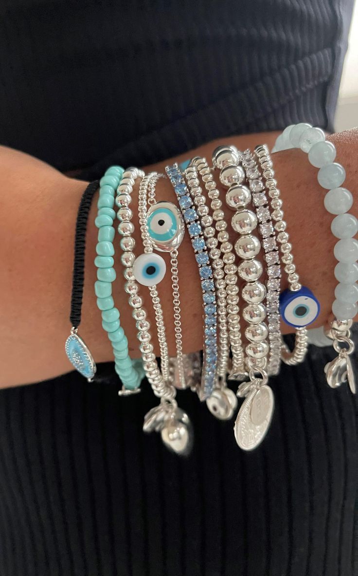 Silver Summer Jewelry Aesthetic, Evil Eyes Jewellery, Evil Eye Jewellery Aesthetic, Bracelet Eye Evil, Silver Jewellery Aesthetic Bracelets, Cute Evil Eye Bracelet Ideas, Where To Buy Bracelets, Silver Evil Eye Jewelry, Evil Eye Bracelet Stack