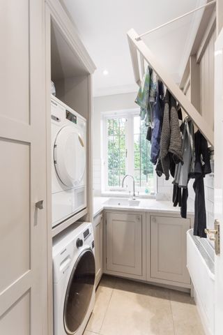 a washer and dryer in a small laundry room