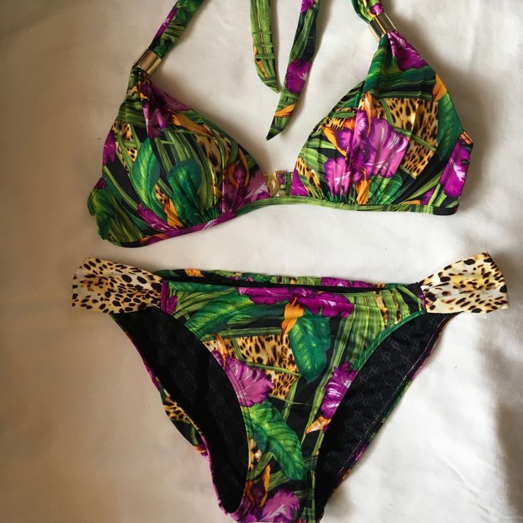 Brand New, Never Worn Swimsuit In A Fun Tropical Print. Bikini Top Is Size M And Bottom Is Size L, Medium Coverage.No Tags Attached. Purple Lined Swimwear For Poolside, Fitted Purple Swimwear For Vacation, Purple Halter Neck Swimwear For Beach, Tropical Print Beachwear For Parties, Tropical Party Swimwear, Fitted Purple Swimwear For Poolside, Purple Lined Swimwear For Beach Season, Victoria's Secret Swimwear For Pool With Lined Body, Victoria's Secret Swimwear With Lined Body