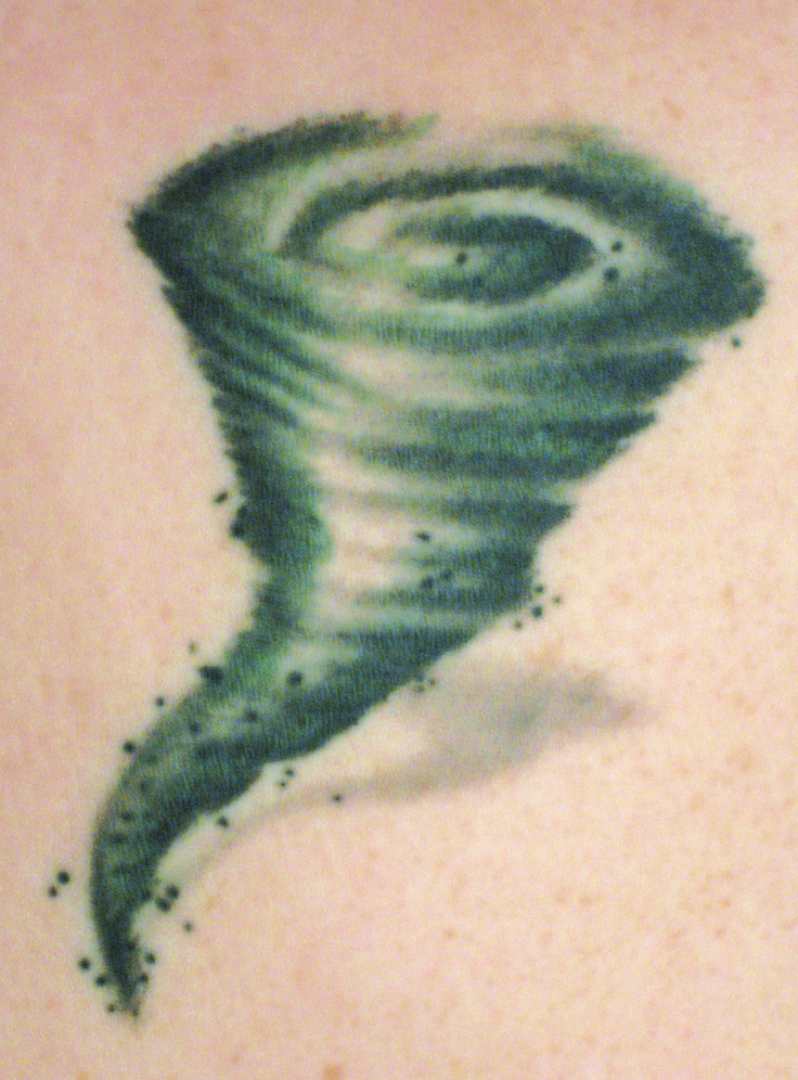 the back of a person's neck with a tattoo on it that looks like a tornado