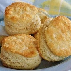 some biscuits are sitting on a plate and ready to be eaten