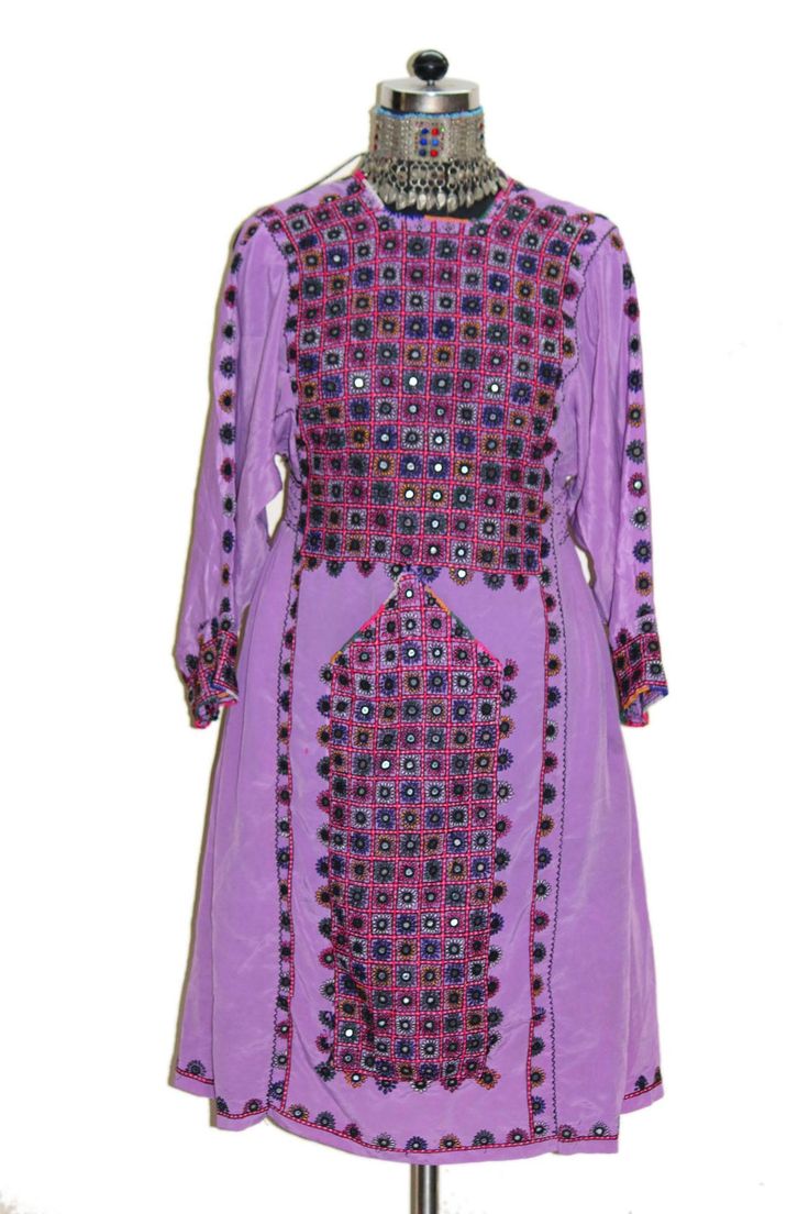 "Item Description Vintage Collection Baluchi Dress Truly amazing gypsy and bohemian vintage authentic Afghanistan treasure. This unique garment is made from vintage textiles hand crafted in Afghanistan. This dress is from Afghanistan and artistically created from vintage pieced fabric. It is all hand made and hand brought from India & pakisthan border ariya . It has a loose silhouette that falls in length to the knee. This garment is a stellar example of the amazing textiles that influence fashi Vintage Pakistan, Dress Hand Embroidery, Cultural Outfits, Balochi Dresses, Embroidery Mirror Work, Kurta Top, Embroidery Mirror, Balochi Dress, Afghan Dress