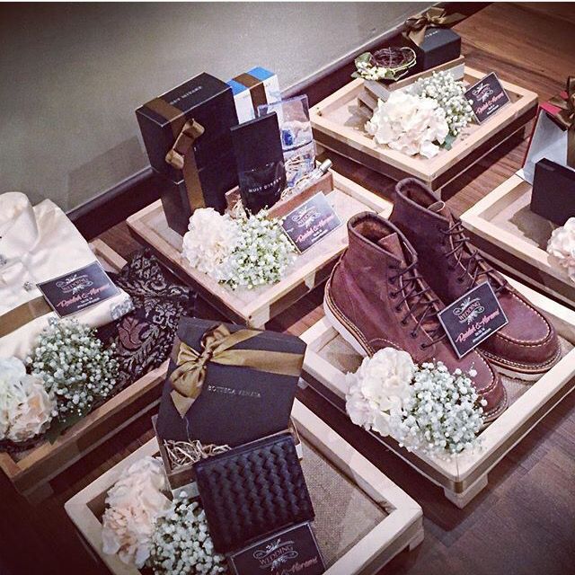 several boxes with flowers and shoes on them