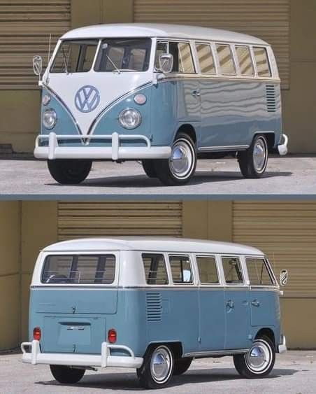 an old vw bus is parked in front of a garage door and another van