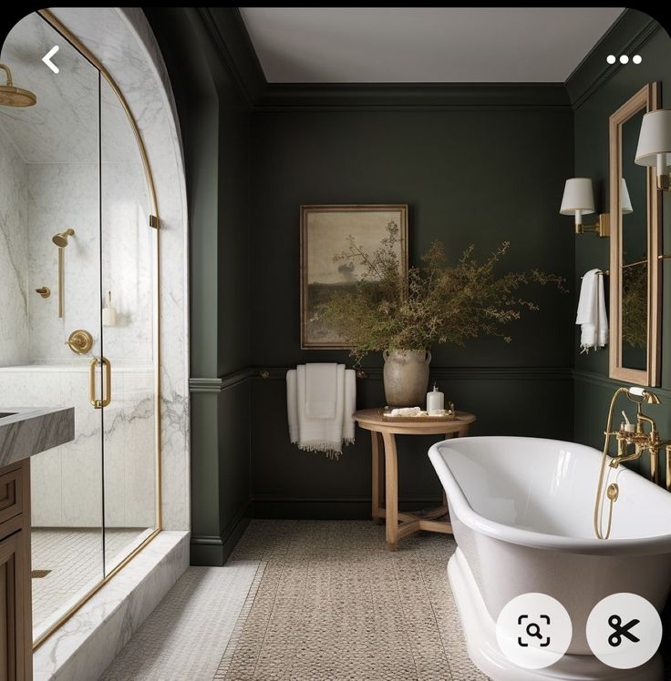 a bathroom with green walls and white bathtub