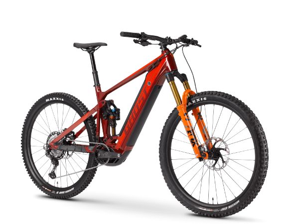 an orange and black mountain bike on a white background