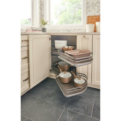 the kitchen is clean and ready to be used as a storage area for pots and pans