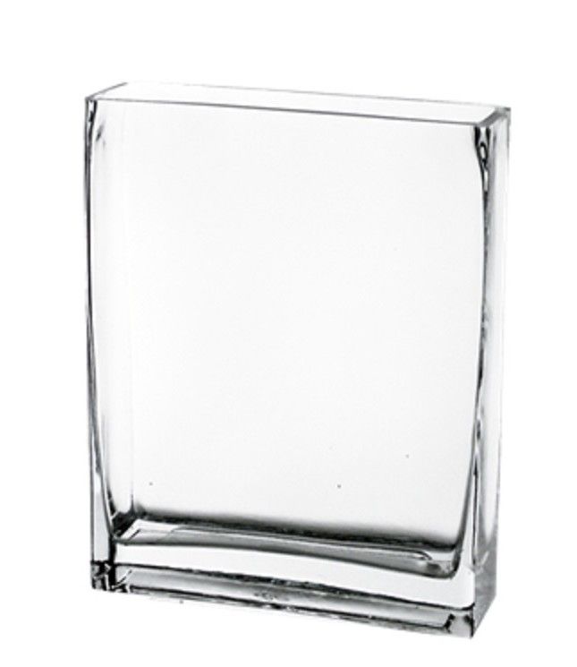 an empty square glass vase on a white background