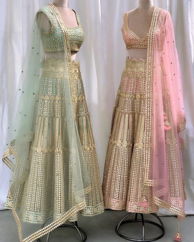 Pastel Green Golden Zari lehenga embellished with mirror embroidery, Teamed with a matching blouse and net dupatta. Includes a gold belt. Composition: Lehenga, Blouse and Dupatta - Net All products can be customised for sleeves, length of blouse and neck design Delivery : 6-8 weeks as the product is hand crafted. Check Size Guide or choose MySize for free customisation (All Sizes above XL can be made at 15% additional cost) For more information and sizes please contact fabiliciousfashion@gmail.c Pista Green Traditional Wear With Gota Work For Reception, Traditional Embellished Pista Green Anarkali Set, Pista Green Sharara With Gota Work For Reception, Pista Green Dupatta With Gota Work For Reception, Pista Green Lehenga With Gota Work In Traditional Drape, Pista Green Lehenga With Gota Work, Designer Pista Green Choli With Dupatta, Designer Embellished Pista Green Choli, Embellished Pista Green Choli For Designer Wear