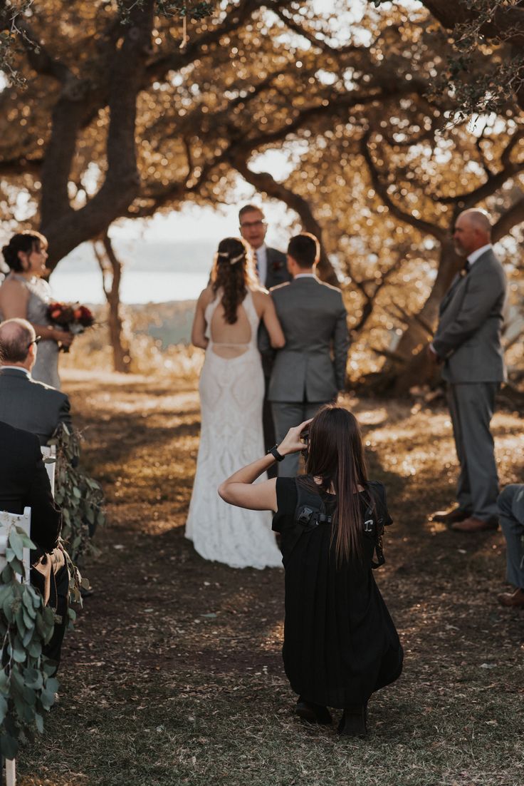 the bride and groom are getting ready to walk down the aisle at their wedding ceremony