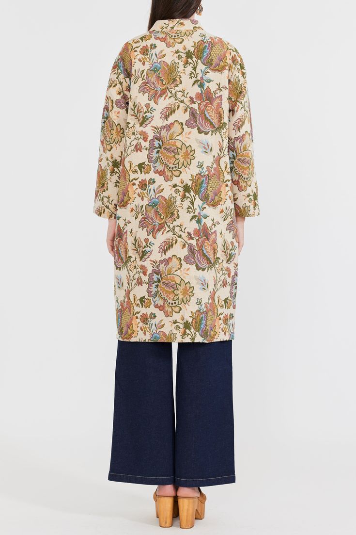 Snuggle up in our Janean midi jacket, your new go-to for chic city commutes as the seasons change. Embrace the relaxed fit and revel in the floral prints while feeling as if you're wrapped in your favorite blanket. Patterned with a muted rainbow floral on cotton jacquard. Inspiration for this textile was drawn from antiques found in Parisian homes, capturing the same timelessness chic. Handle with care and clean delicately. Wash on cold and tumble drying on low or as the care tag recommends, dry Spring Floral Print Outerwear For Daywear, Floral Print Long Sleeve Outerwear For Daywear, Floral Print Relaxed Fit Outerwear For Fall, Relaxed Fit Floral Print Outerwear For Fall, Casual Outerwear With Floral Print For Daywear, Floral Print Outerwear For Fall Workwear, Fall Floral Print Outerwear For Work, Muted Rainbow, Seasons Change