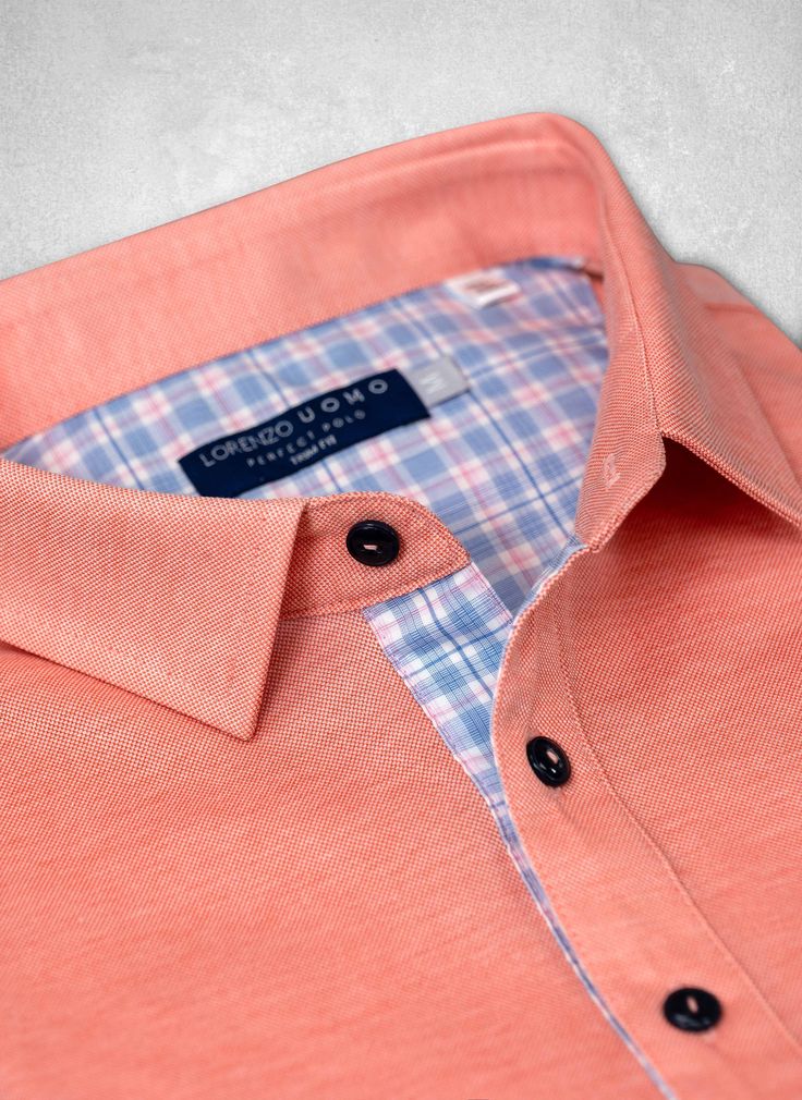 From our Perfect Polo Collection. Inspired by the effortless style worn in Como, our Ultra-Luxurious Perfect Polo Shirt in Coral Heather is meticulously crafted from the finest combed, pique cotton. The hand is super-soft, similar to that of a well-worn tee. We have incorporated bespoke design elements such as elegant white & blue abstract contrast fabric on the inside, complimenting the body of the polo, as well as navy-colored contrast buttons, thoughtfully stitched with body-colored contrast Polo Shirt Style, Menswear Details, Cotton Polo Shirt, Coral Blue, Bespoke Design, Blue Abstract, Effortless Style, Workout Shirts, Shirt Style