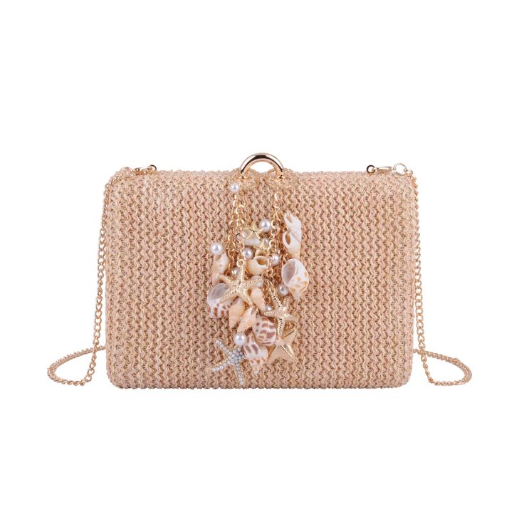 Dive into summer elegance with our Raffia Clutch featuring assorted seashell accents and a stylish chain crossbody strap. This beach-inspired accessory combines the natural charm of raffia with the whimsy of assorted seashells, creating a unique and fashionable statement piece. The chic chain crossbody strap adds a touch of modern flair, making it a versatile companion for both casual outings and special occasions. Embrace the coastal vibes and elevate your style with this one-of-a-kind clutch, Summer Beach Bags Made Of Shell, Beige Chain Strap Beach Bag, Chic Gold Straw Bag, Chic Beige Straw Bag As Gift, Chic Beige Straw Bag For Gift, Summer Beach Beaded Straw Bag, Summer Vacation Beaded Straw Bag, Rectangular Straw Bag With Chain Strap For Vacation, Elegant Summer Beach Bags