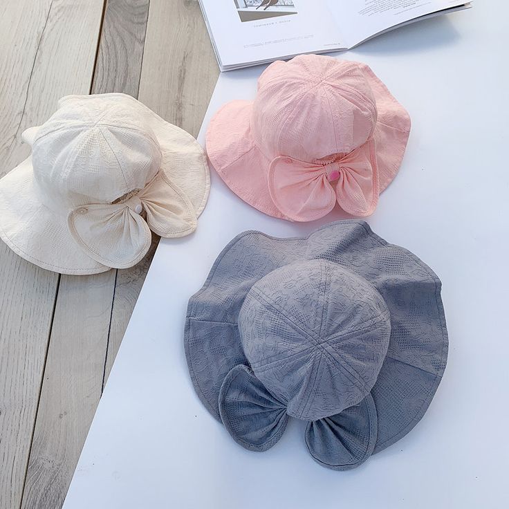 Dress Your Little Princess Add a touch of charm to your baby girl's wardrobe with our adorable Princess Baby Bucket Hat. Crafted from soft cotton, this sun hat not only provides protection from the sun's rays but also adds a stylish flair to any outfit. Whether you're heading to the beach, going for a stroll in the park, or simply enjoying a sunny day outdoors, our bucket hat ensures your little one stays comfortable and fashionable all day long. Unveiling the Features Soft Cotton Material: Made Cute Summer Sun Hat For Playtime, Cute Summer Sun Hat For Play, Cute Summer Hats For Playtime, Summer Sun Hat With Uv Protection For Playtime, Cute Beige Sun Hat For The Beach, Cute Beige Beach Sun Hat, Uv Protection Sun Hat For Summer Playtime, Spring Adjustable Hats For Play, Adjustable Cotton Sun Hat With Uv Protection