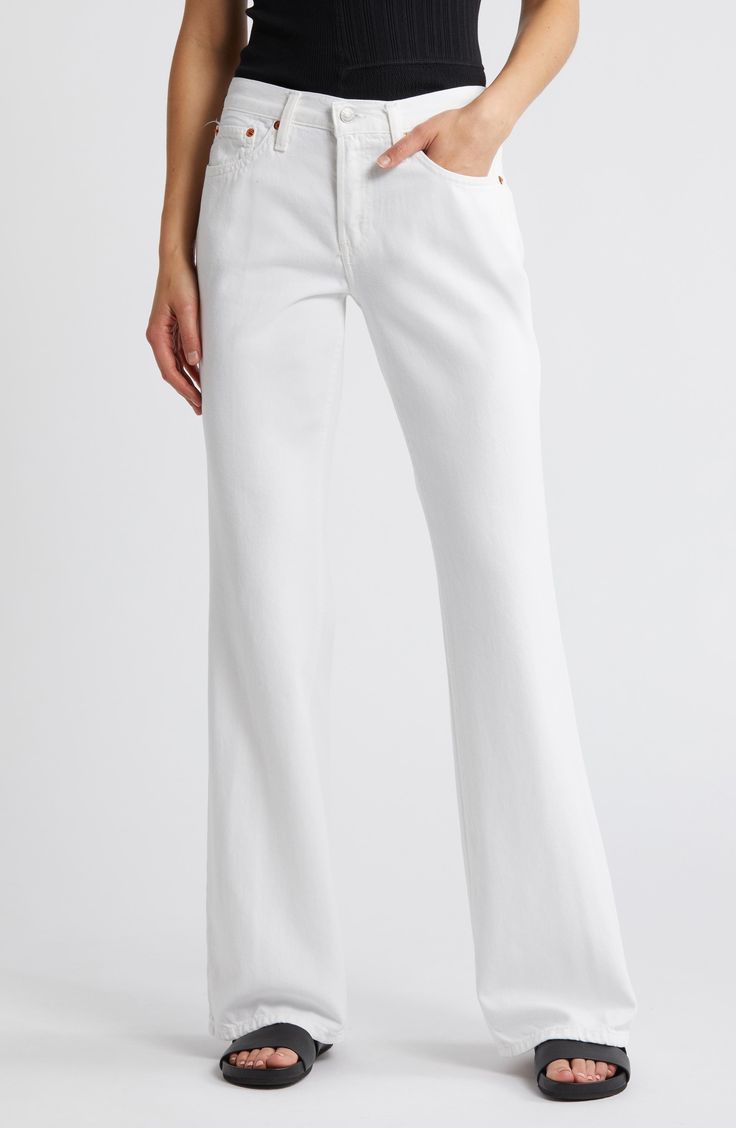 Effortlessly cool and laid-back, these slouchy, full-length bootcut jeans are made from lightweight, flowy denim in a bright-white wash. 33 1/2" inseam; 20" leg opening; 10" front rise; 13 1/2" back rise (size 29) Button fly Five-pocket style 75% cotton, 25% lyocell Machine wash, tumble dry Imported White Flare Jeans With Five Pockets, White Flare Pants With Five Pockets, Classic White Flare Bottoms, Elegant Flare Jeans With Five Pockets For Spring, White Fitted Flare Jeans With Five Pockets, Fitted White Flare Jeans With Five Pockets, Classic White Denim Flare Jeans, Chic White Jeans With Straight Hem, Classic White Cotton Flare Jeans