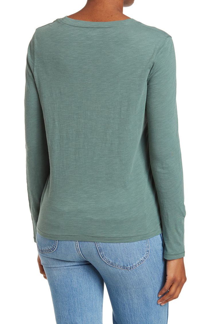 Perfect for styling versatile looks, this long sleeve T-shirt is a wardrobe essential. 23 1/2" length (size Medium) Crewneck Long sleeves Chest patch pocket 100% cotton Machine wash, dry flat Imported Women's Clothing Soft-washed Stretch Tops For Spring, Versatile Soft-washed Cotton Top, Casual Scoop Neck Tops For Fall, Casual Stretch Crew Neck Tops, Cotton Tops For Casual Gatherings In Fall, Versatile Crew Neck Tops For Fall, Versatile Relaxed Fit T-shirt For Fall, Soft-washed Crew Neck Top For Layering, Versatile Cotton Tops For Casual Gatherings