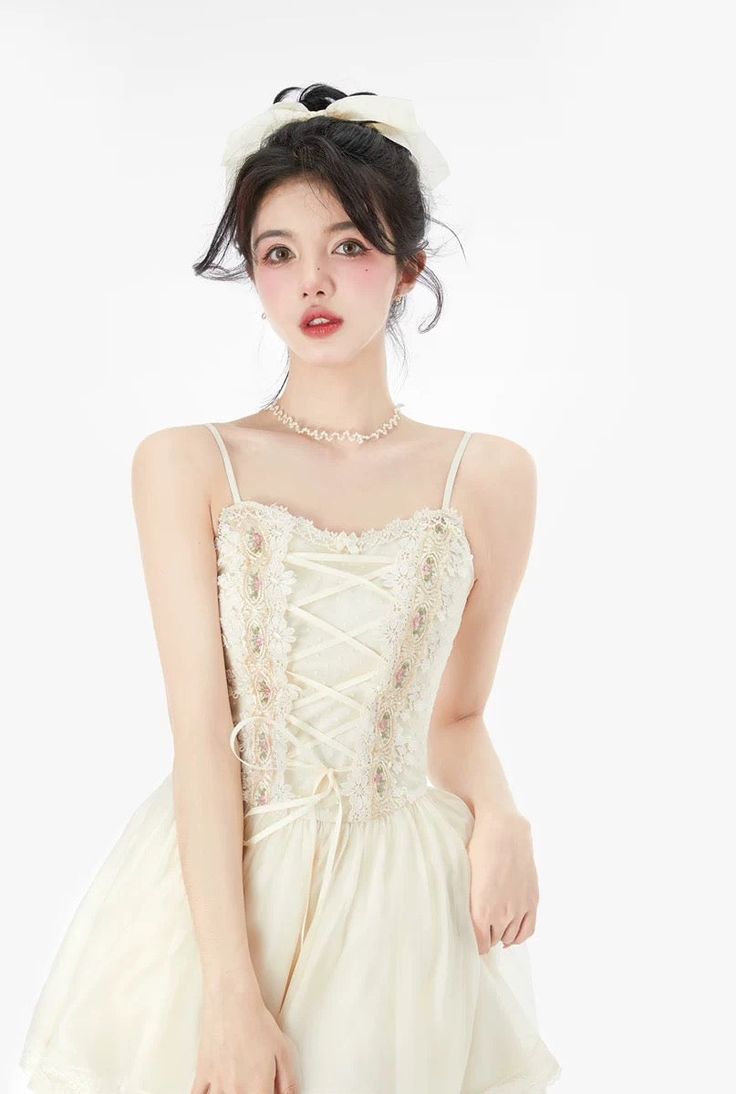 Size Chart 
 
 
 
 
 
 Size 
 
 
 Bust 
 
 
 Length 
 
 
 Waist 
 
 
 
 
 XS 
 
 
 76 
 
 
 77 
 
 
  62 
 
 
 
 
 S 
 
 
 80 
 
 
 79 
 
 
  66 
 
 
 
 
 M 
 
 
 86 
 
 
 81 
 
 
  70 
 
 
 
 
 L 
 
 
 90 
 
 
 83 
 
 
 74 
 
 
 
 
 
 There is 2-3 cm difference according to manual measurement. Please check the measurement chart carefully before you buy the item. Due to the light and screen, a slight color difference may be expected. Thank you for your understanding! Beige Balletcore Dress, Sleeveless Balletcore Dress With Lace Trim, Fitted Sleeveless Balletcore Dresses, Cream Sleeveless Dress With Corset Back, Beige Dress With Boned Bodice, Cream Sleeveless Corset Dress, Modern Romance, Measurement Chart, Effortless Chic