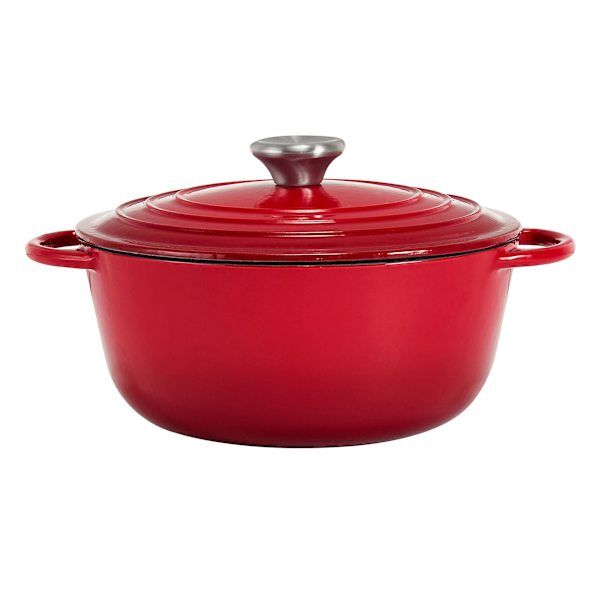 a red casserole dish with a lid and handle on the side, sitting in front of a white background