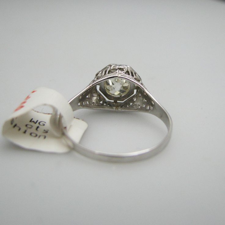 "For sale: (1) g009 Pretty 14k White Gold Diamond Old Mine Cut Engagement Ring PLEASE READ ENTIRE DESCRIPTION BEFORE PURCHASING Pre-owned item. Good condition. Please see pictures for details. Sold as is, as seen on pictures. This ring contains one diamond (round cut). It is stamped. Specifics: 14k White gold Diamonds: 0.85CT/TCW Size: 7.5 (U.S.) Width: 9 mm Total Weight: 1.7 grams Please be 100% sure of your purchase before buying, as we do not offer refunds. We are more than happy to provide a Collectible Platinum Rings With Brilliant Cut, Elegant Round Cut Diamond Ring With 17 Jewels, Formal Jewelry With Vvs Clarity Round Cut, Fine Jewelry With Brilliant Cut For Formal Occasions, Collectible Platinum Diamond Ring With Brilliant Cut, 14k Gold Art Deco Jewelry, Stamped 14k Diamond Fine Jewelry, Art Deco White Gold Jewelry With 17 Jewels, Brilliant Cut 14k Gold Silver Jewelry