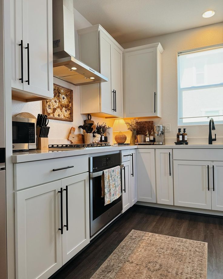 the kitchen is clean and ready for us to use it's new stove top oven