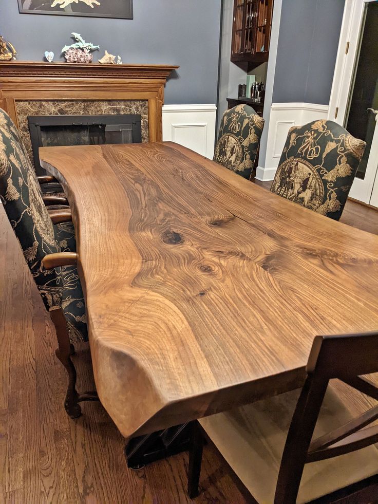 a large wooden table with chairs around it