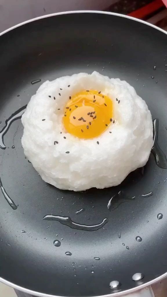 a fried egg in a frying pan on the stove