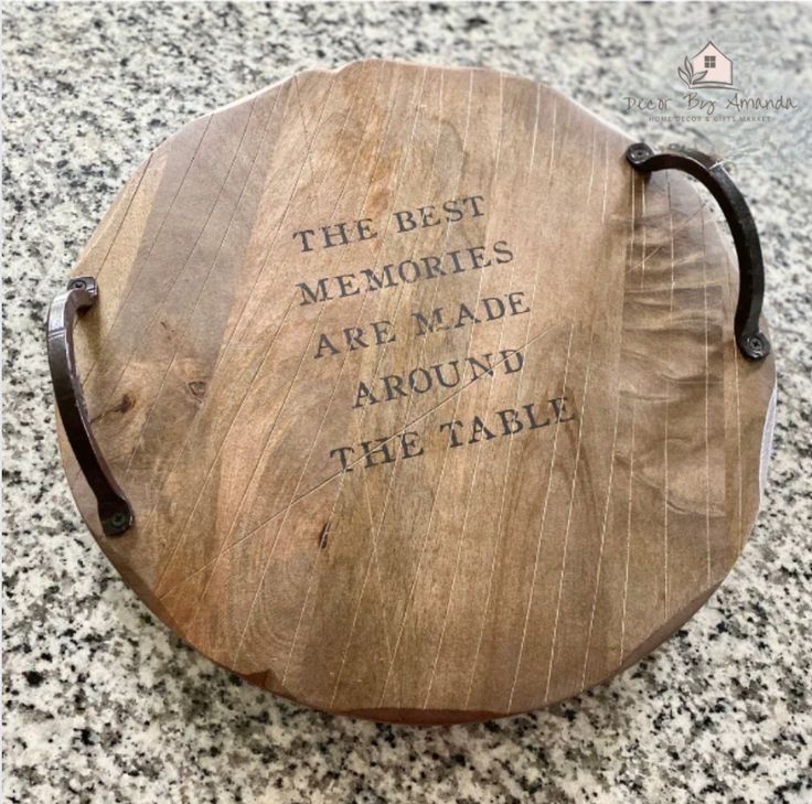 the best memories are made around the table engraved on a wooden board with leather handles