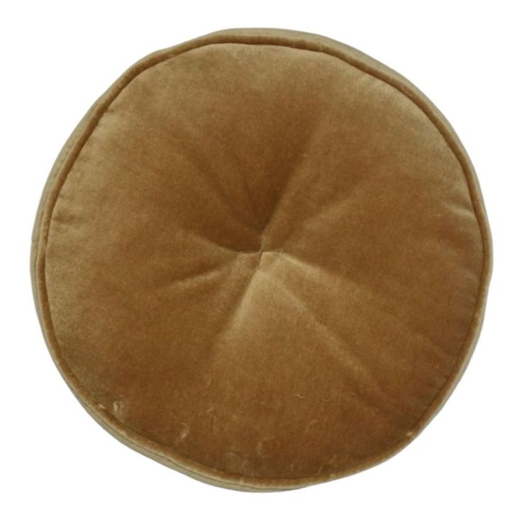 a brown round cushion on a white background