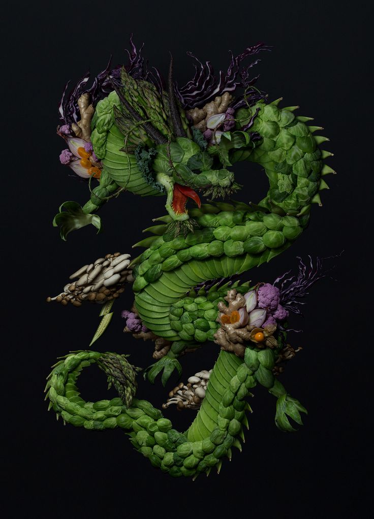 a green dragon with purple flowers on it's back