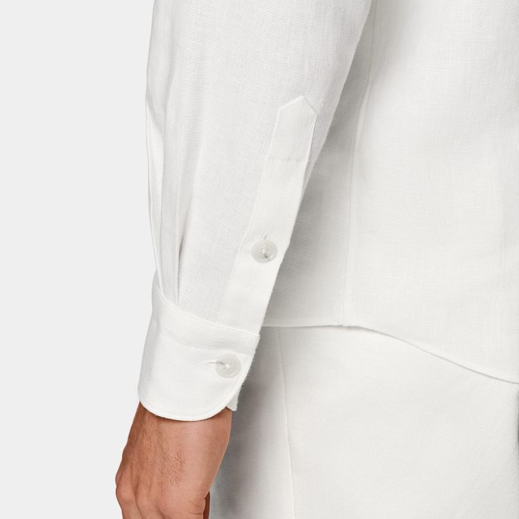 This casual white shirt is tailored to a relaxed fit, and features a single cuff and classic collar. Classic Linen Shirt With Button Cuffs, White Cotton Shirt With Concealed Placket, White Linen Shirt With Button Cuffs, White Shirt With Welt Pockets And Spread Collar, White Casual Dress Shirt With Spread Collar, White Cotton Dress Shirt With Fold-down Collar, White Collared Shirt With Welt Pockets, White Long Sleeve Dress Shirt With Concealed Placket, Timeless White Relaxed Fit Top